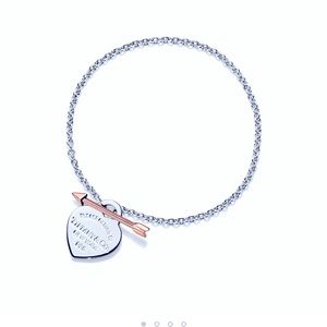 Tiffany’s love struck bracelet.